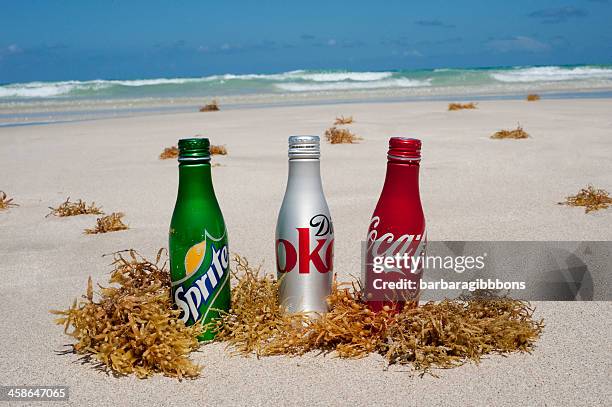 bottles in miami beach. - can beach sun stock pictures, royalty-free photos & images