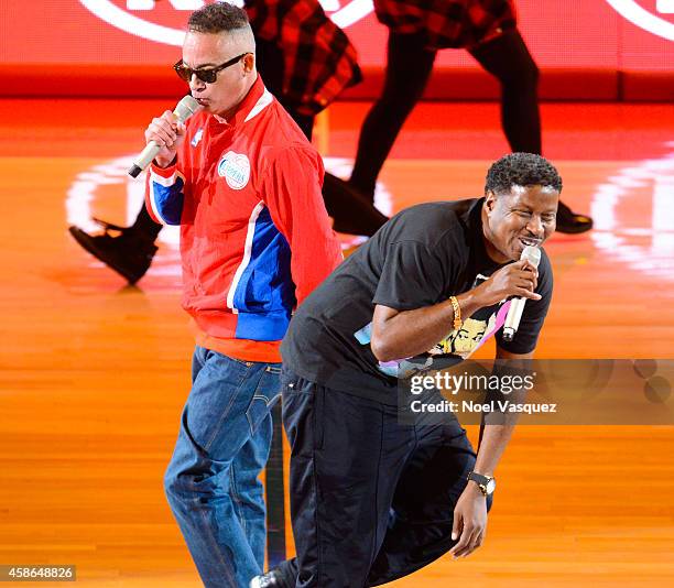 Christopher "Kid" Reid and Christopher "Play" Martin of Kid 'n Play perform during halftime at a basketball game between the Portland Trail Blazers...