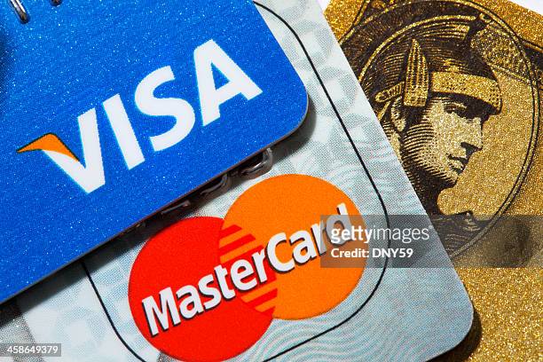 three credit cards - credit card and stapel stockfoto's en -beelden