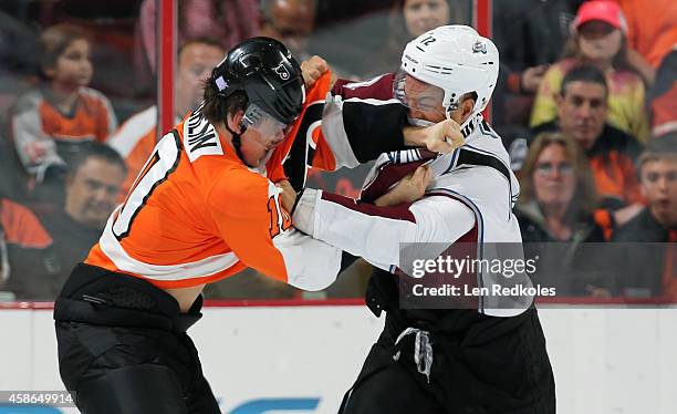 Brayden Schenn of the Philadelphia Flyers fights Jarome Iginla of the Colorado Avalanche in the second period on November 8, 2014 at the Wells Fargo...