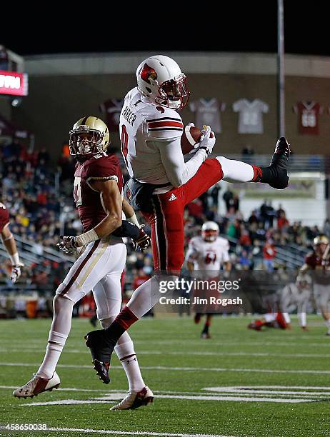 DeVante Parker of the Louisville Cardinals scores a touchdown against the Boston College Eagles in the second quarter at Alumni Stadium on November...