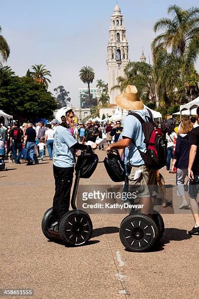 segway riders - balboa park stock pictures, royalty-free photos & images