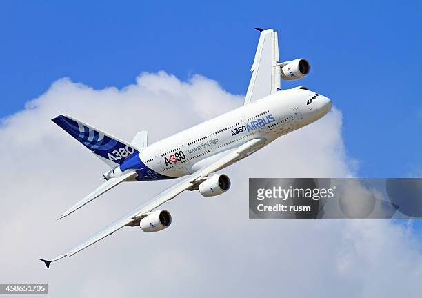 flying airbus a380 - airbus a380 stock pictures, royalty-free photos & images
