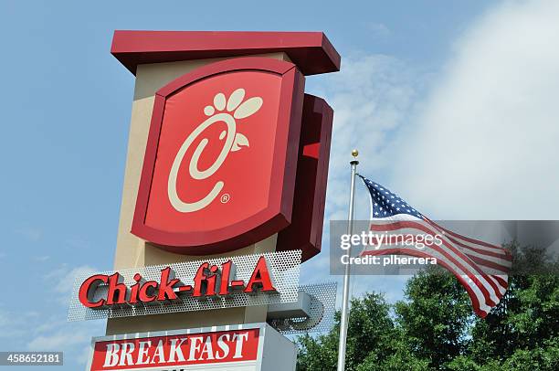 chick-fil-a logo sign - chick fil a stock pictures, royalty-free photos & images