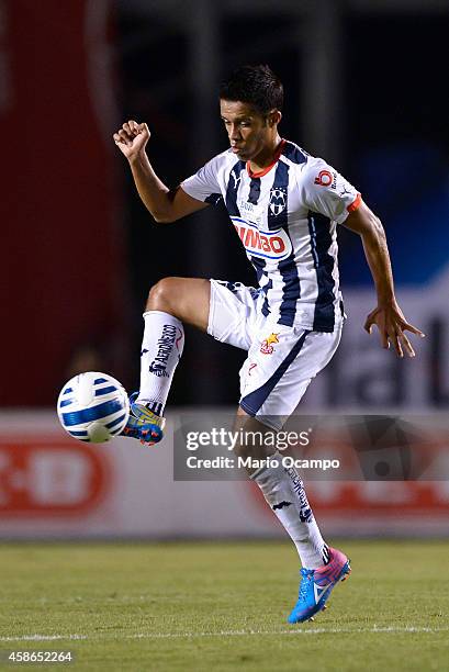 Severo Meza of Monterrey receives the ball during a match between Monterrey and Chiapas as part of 16th round Apertura 2014 Liga MX at Tecnologico...