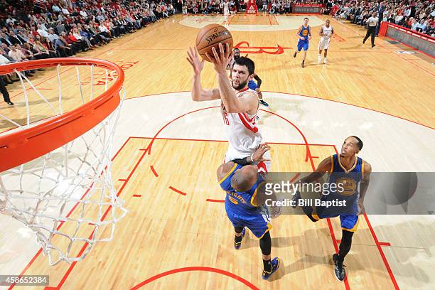 Kostas Papanikolaou of the Houston Rockets goes up for a shot against the Golden State Warriors during the game on November 8, 2014 at the Toyota...