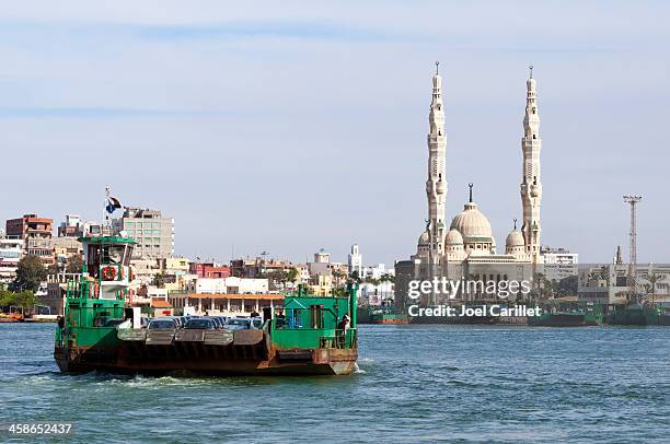 suez canal ferry and mosque - port said stock pictures, royalty-free photos & images