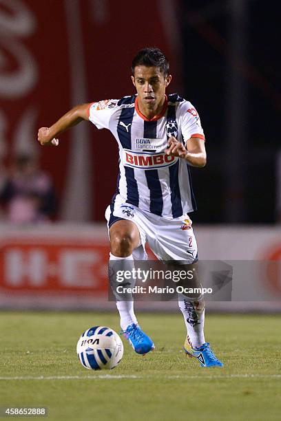 Severo Meza of Monterrey drives the ball during a match between Monterrey and Chiapas as part of 16th round Apertura 2014 Liga MX at Tecnologico...