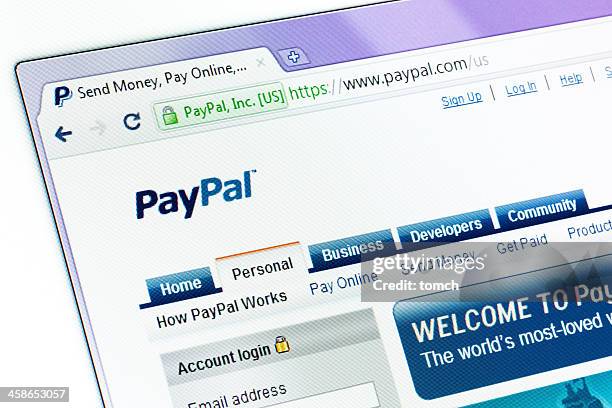 paypal-homepage auf dem browser-fenster - paypal stock-fotos und bilder