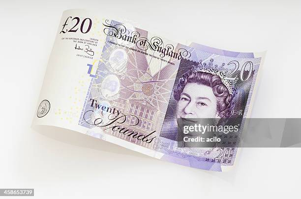 waved twenty pound note / british currency - tjugopundsedel bildbanksfoton och bilder