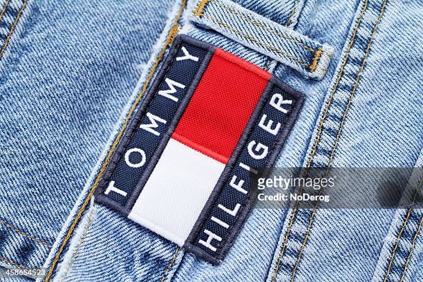 tommy hilfiger jeans - tommy hilfiger designer label stock pictures, royalty-free photos & images