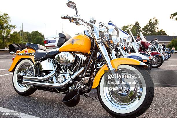 custom harley davidson fat boy motorcycle, parked on "bike night" - harley davidson stockfoto's en -beelden