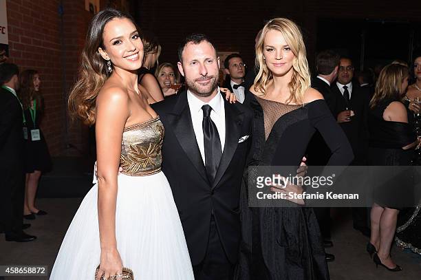 Actress Jessica Alba and Jeffrey Housenbold of shutterfly and co-President of Baby2Baby Kelly Sawyer attend the 2014 Baby2Baby Gala, presented by...