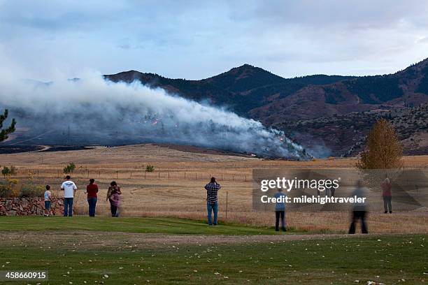 residents watch colorado wild fire burn behind homes - wildfires colorado stock pictures, royalty-free photos & images