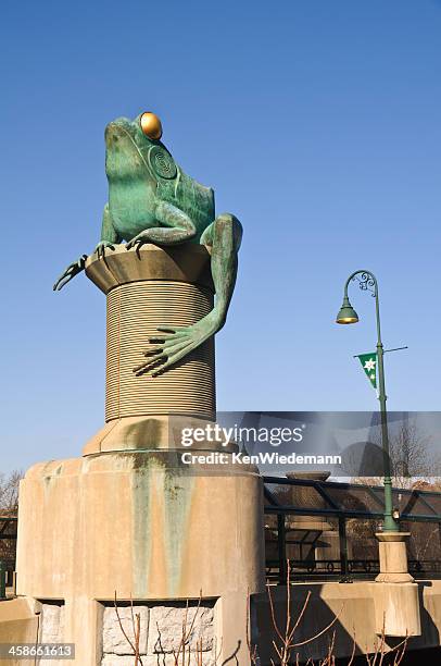 giant frogs along the bridge - giant frog stock pictures, royalty-free photos & images