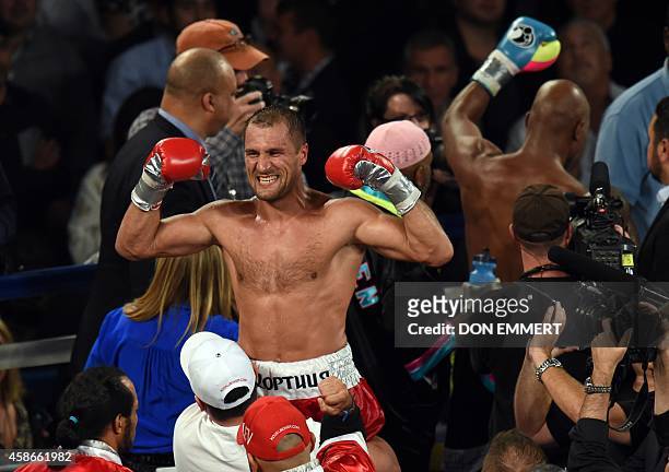 Sergey Kovalev of Russia celebrates after defeating Bernard Hopkins of the US during the light heavyweight unification bout November 8, 2014 in the...