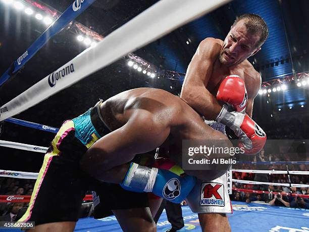 Sergey Kovalev punches Bernard Hopkins during their IBF, WBA, & WBO Light Heavyweight title fight at Boardwalk Hall Arena on November 8, 2014 in...