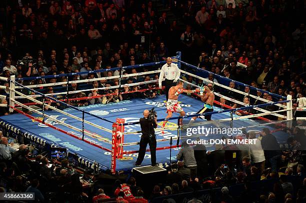 Bernard Hopkins of the US and Sergey Kovalev of Russia during the light heavyweight unification bout November 8, 2014 in the Boardwalk Hall in...