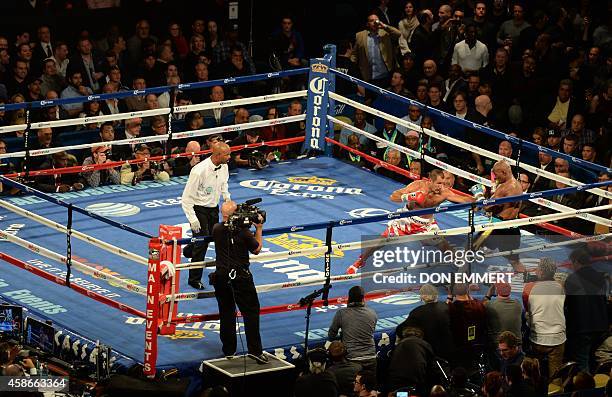 Bernard Hopkins of the US and Sergey Kovalev of Russia during the light heavyweight unification bout November 8, 2014 in the Boardwalk Hall in...