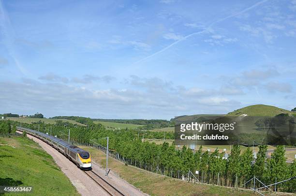 eurostar train approaching the channel tunnel - eurostar stock pictures, royalty-free photos & images