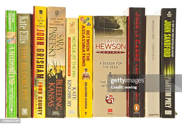 paperback books on white - paperback stock pictures, royalty-free photos & images