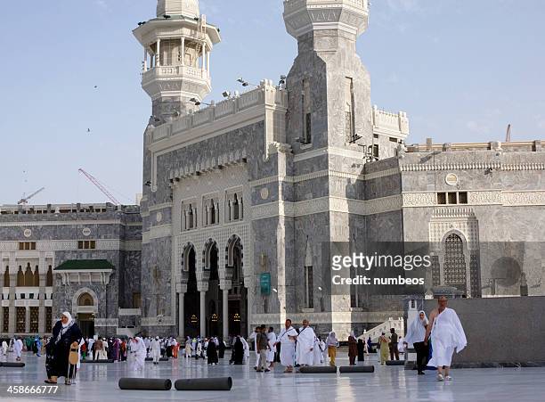 muslim pilgrims at the masjid al-haram, mecca, saudi arabia - masjid al haram stock pictures, royalty-free photos & images