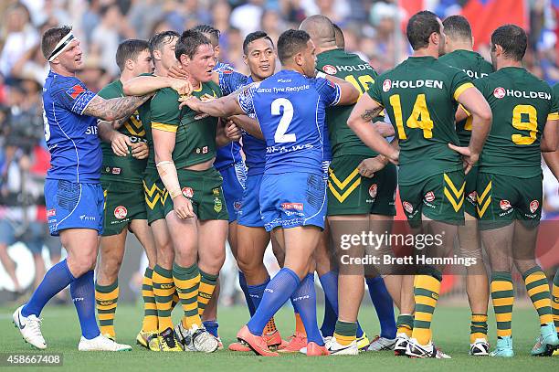 Players scuffle during the Four Nations match between the Australian Kangaroos and Samoa at WIN Stadium on November 9, 2014 in Wollongong, Australia.