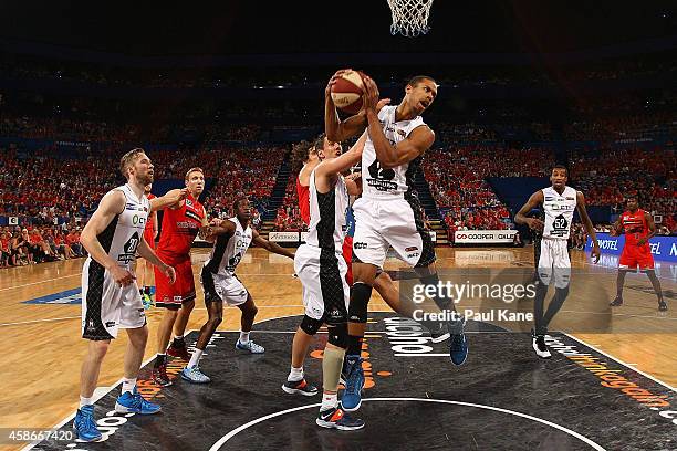 Stephen Dennis of United rebounds during the round five NBL match between the Perth Wildcats and the Melbourne United at Perth Arena on November 9,...
