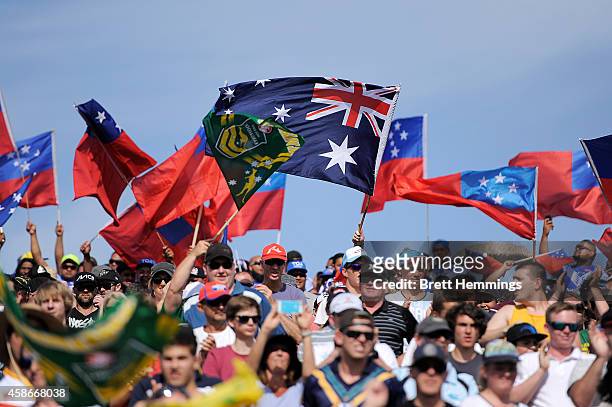 Fans enjoy the atmosphere during the Four Nations match between the Australian Kangaroos and Samoa at WIN Stadium on November 9, 2014 in Wollongong,...