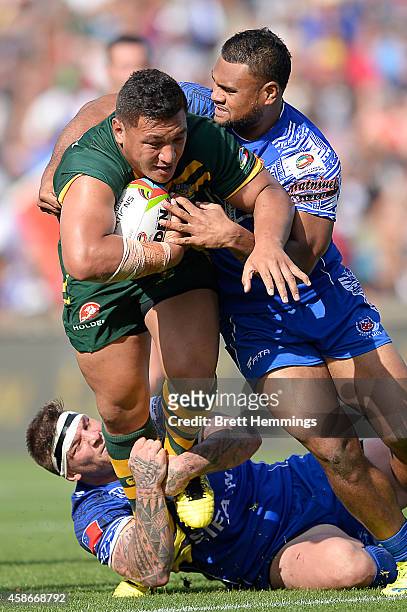 Josh Papalii of Australia is tackled during the Four Nations match between the Australian Kangaroos and Samoa at WIN Stadium on November 9, 2014 in...