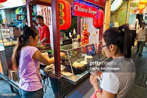 singapore bugis street fast food stall - singapore alley stock pictures, royalty-free photos & images
