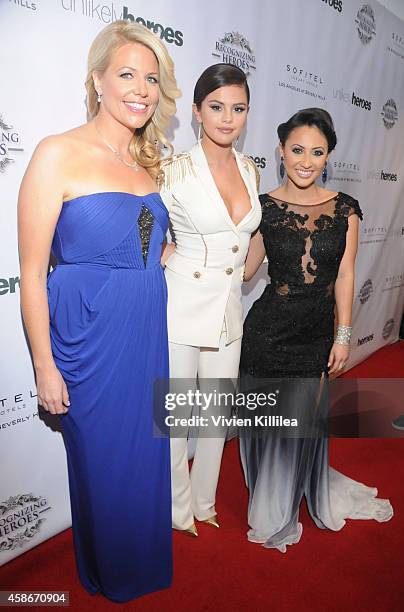 Founder and CEO of Unlikely Heroes Erica Greve, actress / singer Selena Gomez and actress Francia Raisa attend the Unlikely Heroes' 3rd Annual Awards...