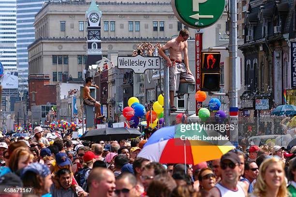 pride parade, toronto, kanada - yonge street stock-fotos und bilder