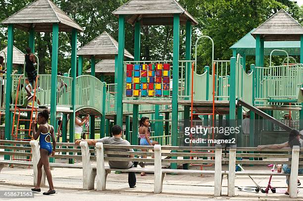 children playing at the playground - the bronx stockfoto's en -beelden