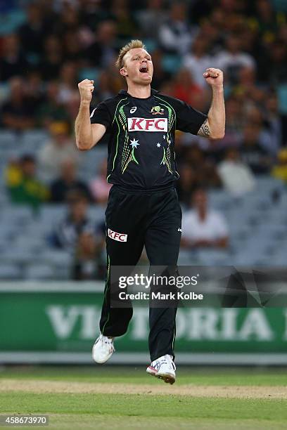 Doug Bollinger of Australia celebrates taking the wicket of Reeza Hendricks of South Africa during game three of the Men's International Twenty20...