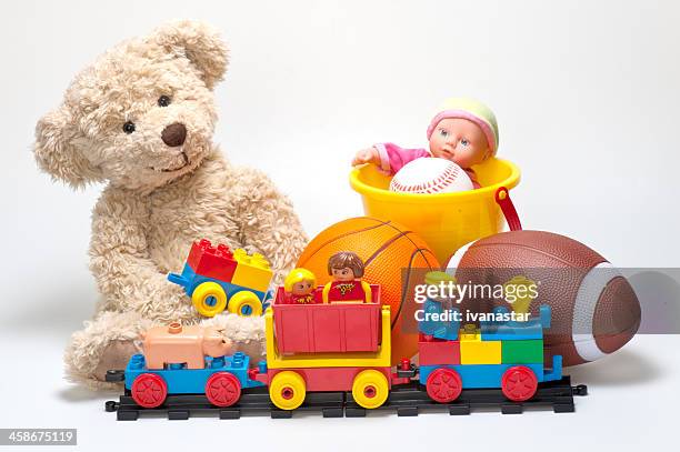 lego duplo blocks, figures, teddy bear, balls and toys - charity ball stock pictures, royalty-free photos & images