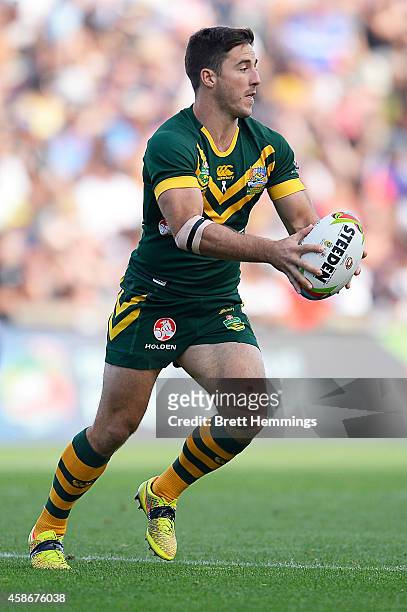 Ben Hunt of Australia runs the ball during the Four Nations match between the Australian Kangaroos and Samoa at WIN Stadium on November 9, 2014 in...