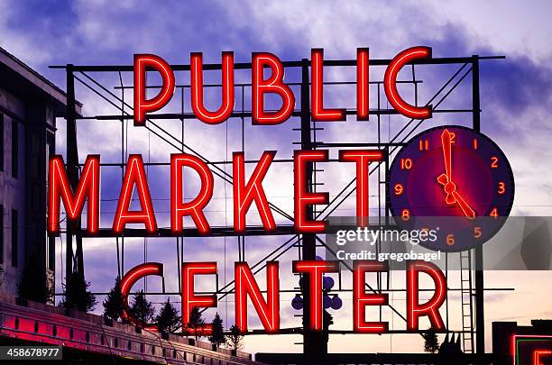 public market center sign at pike place in seattle, washington - pike place market stock pictures, royalty-free photos & images
