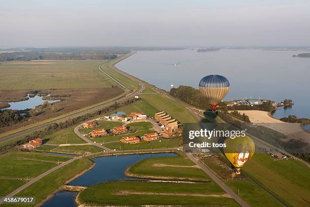 hot air balloons over veluwemeer, the netherlands - veluwemeer bildbanksfoton och bilder