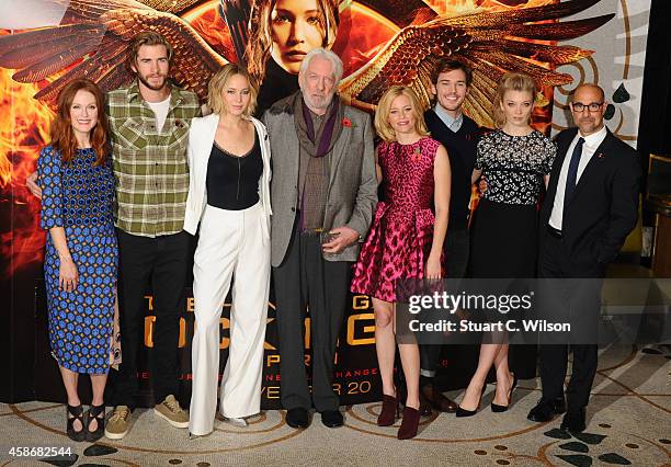 Julianne Moore, Liam Hemsworth, Jennifer Lawrence, Donald Sutherland, Elizabeth Banks, Sam Claflin, Natalie Dormer and Stanley Tucci attend the...