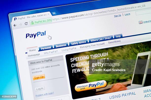 paypal-homepage auf dem browser-fenster - paypal stock-fotos und bilder