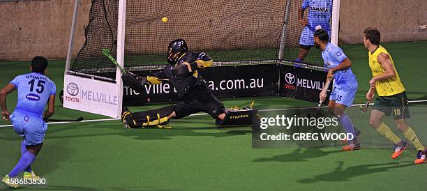 Uthappa Sannuvanda scores the third goal for India during the final match of the four match field hockey Test series against Australia in Perth on...