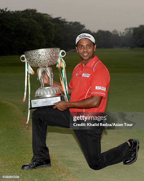 Chowrasia of India posing with the trophy after winning of the Panasonic Open during round four of the Panasonic Open India at Delhi Golf Club on...