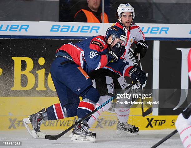 Roman Rac of Team Slovakia and Dominik Schlumpf of Team Switzerland during the game between Slovakia and Switzerland on November 9, 2014 in Munich,...