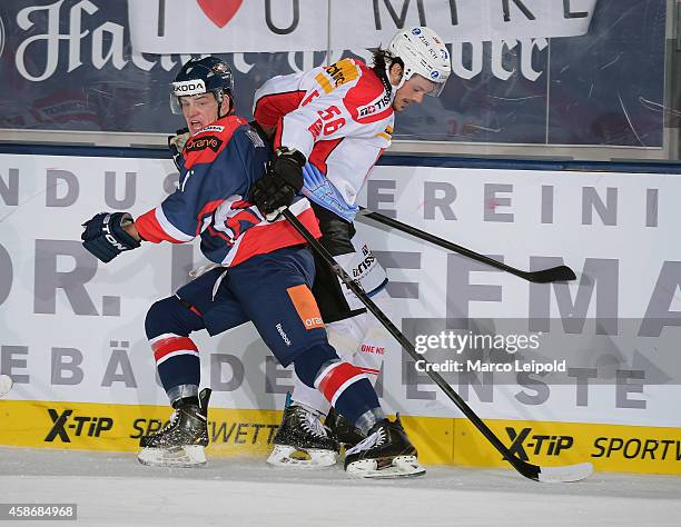 Patrik Lusuak of Team Slovakia and Dino Wieser of Team Switzerland duel during the game between Slovakia and Switzerland on November 9, 2014 in...