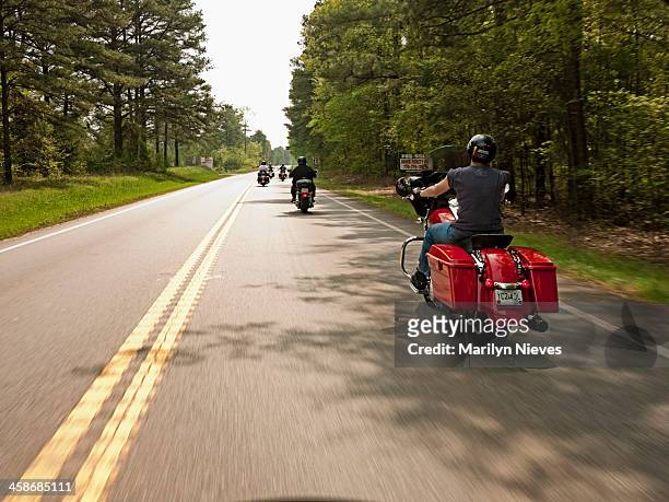 motorcycle road trip - harley davidson woman stock pictures, royalty-free photos & images