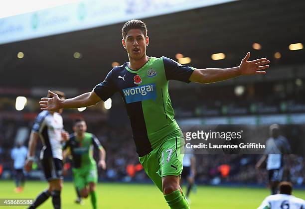 Ayoze Perez of Newcastle United celebrates as he scores their first goal during the Barclays Premier League match between West Bromwich Albion and...