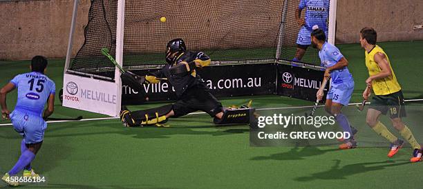 Uthappa Sannuvanda scores the third goal for India during the final match of the four match field hockey Test series against Australia in Perth on...