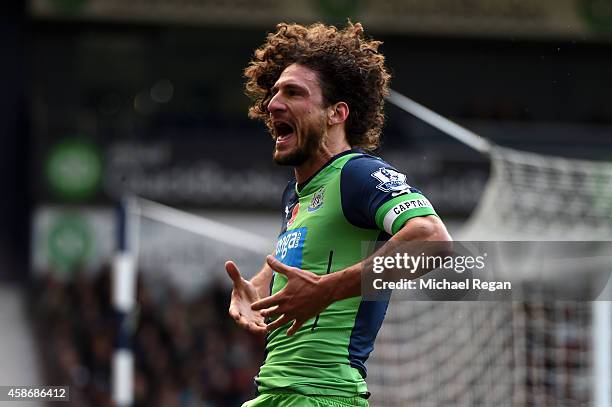 Fabricio Coloccini of Newcastle United celebrates as he scores their second goal during the Barclays Premier League match between West Bromwich...