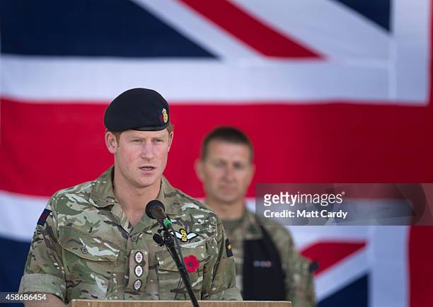 Prince Harry speaks as he joins British troops and service personal remaining in Afghanistan and International Security Assistance Force personnel...
